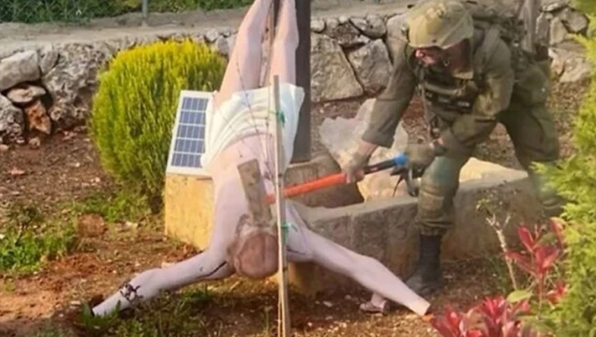 Israeli Barbarism: Verified Footage of Soldier Desecrating Jesus Statue Sparks Global Outrage