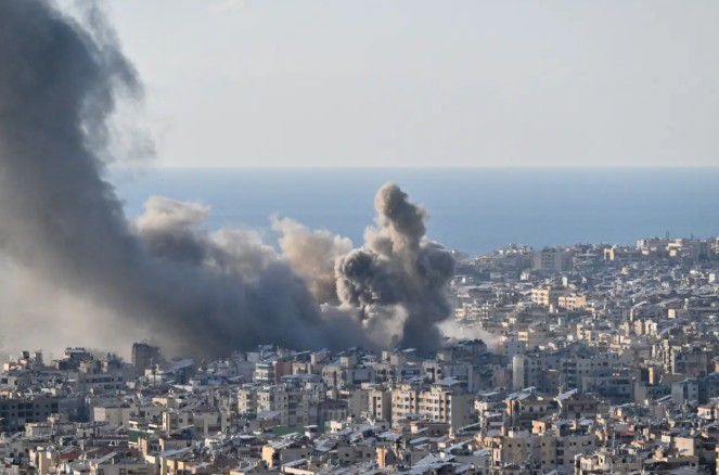 US Navy ships maintaining a full blockade at the mouth of the Persian Gulf during the 2026 Iran crisis.