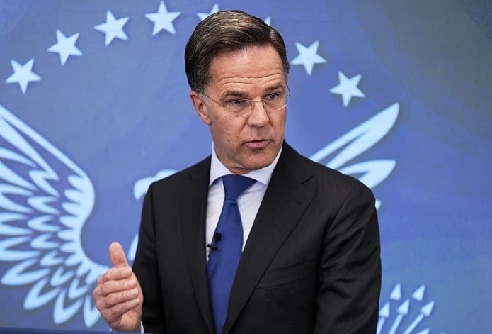 President Donald Trump and NATO Secretary General Mark Rutte in a high-tension meeting environment, symbolizing the strain on the 80-year-old alliance.