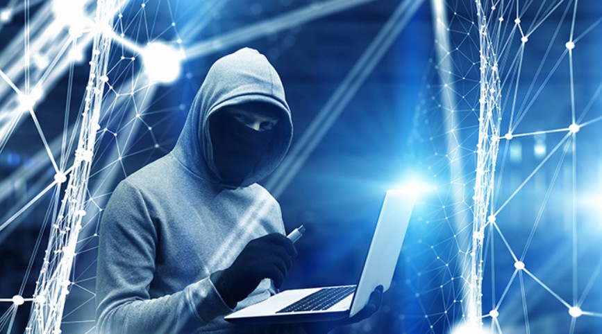 A high-tech digital visualization showing a DNA double helix dissolving into binary code, overlaid with a glowing red warning sign and the flags of the United Kingdom and China.